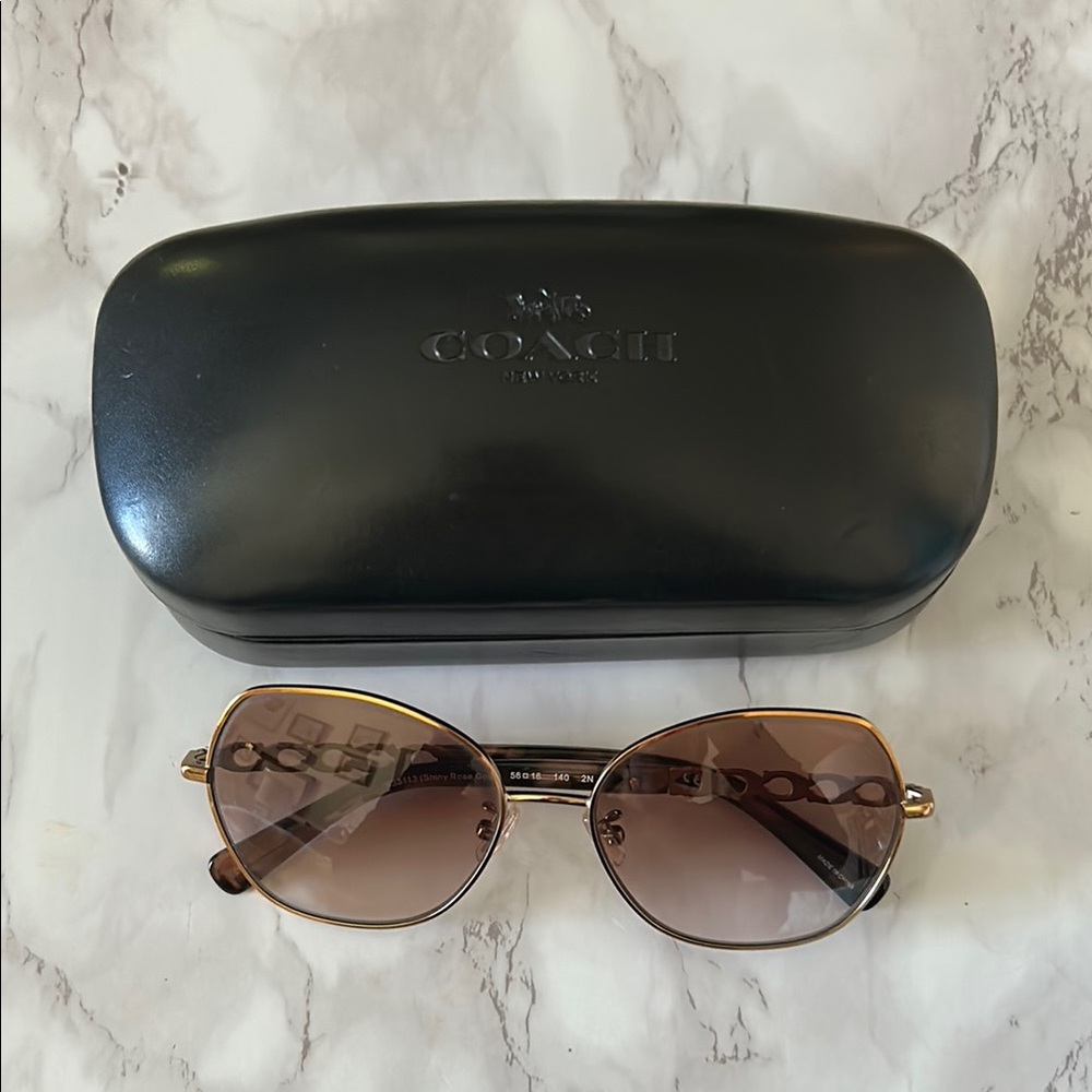 Coach Brown Oval Sunglasses with Gradient Lenses